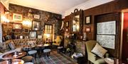 Bar seating in The Black Swan Restaurant in Ravenstonedale, Cumbria