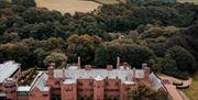 Aerial view of hotel and grounds at Abbey House Hotel & Gardens in Barrow-in-Furness, Cumbria