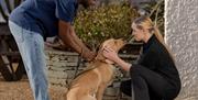 Guests with dog at The Swan at Grasmere in the Lake District, Cumbria