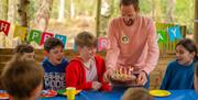 Family gathered for a birthday celebration at Go Ape in Grizedale Forest in the Lake District, Cumbria