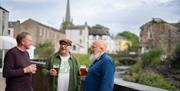 Patrons enjoying a pint at Jennings Brewery in Cockermouth, Cumbria