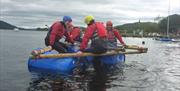 Visitors Raft Building with Joint Adventures in the Lake District, Cumbria