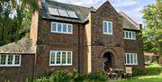 Exterior and Outdoor Seating at Keepers Cottage in Ivegill, Cumbria