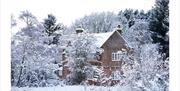 Snow and frost on the grounds of Keepers Cottage in Ivegill, Cumbria