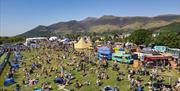 Tents and visitors at Keswick Mountain Festival in Keswick, Lake District