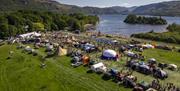 Aerial view of tents and visitors at Keswick Mountain Festival in Keswick, Lake District