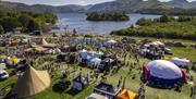 Aerial view of tents and visitors at Keswick Mountain Festival in Keswick, Lake District