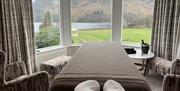 Massage table at a venue with lake views from Lake District Pamper Company