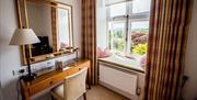 Dressing Table and Window Seat in a Bedroom at Lindeth Howe in Bowness-on-Windermere, Lake District