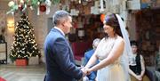 A Couple Celebrating Their Wedding at Lindeth Howe in Bowness-on-Windermere, Lake District