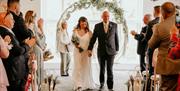 A Couple Celebrating Their Wedding at Lindeth Howe in Bowness-on-Windermere, Lake District