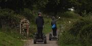 Visitors enjoying an experience with Lakeland Segway in Cartmel, Lake District