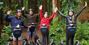 Visitors enjoying an experience with Lakeland Segway in Cartmel, Lake District