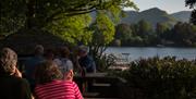 Guests enjoying the view from Lakeside Café Restaurant in Keswick, Lake District
