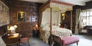 Historic bedroom interior at Levens Hall & Gardens in Levens, Cumbria