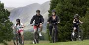 Family Cycling near Limefitt Holiday Park in Troutbeck, Lake District