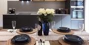 Dining settings at The Barn at Linden Farm House in Langwathby, Cumbria