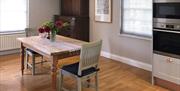 Dining table at The Cottage at Linden Farm House in Langwathby, Cumbria