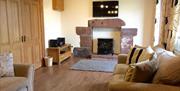 Living Room at Dickinson Place Holiday Cottages in Allonby, Cumbria