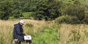 Visitor Sketching in Nature at an Art Course with Long House Studios in Kentmere, Lake District