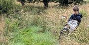 Visitor Sketching in Nature at an Art Course with Long House Studios in Kentmere, Lake District