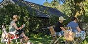 Visitors Sketching in Nature at an Art Course with Long House Studios in Kentmere, Lake District