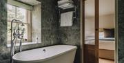 Ensuite bathroom with freestanding bathtub in the House at Meadow Brow Estate in Grasmere, Lake District