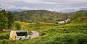 A Mountain Goat Tours Minibus in the Beautiful Scenery of the Lake District, Cumbria