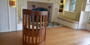 Chair by MH Baillie-Scott at Blackwell, the Arts & Crafts House, Bowness-on-Windermere, Lake District.