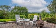 Outdoor seating at a unit at Windermere Stays in the Lake District, Cumbria