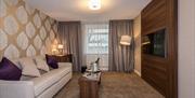 Lounge Space in a Bedroom at The Melbreak Hotel in Great Clifton, Cumbria