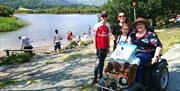 Family Using a Tramper Hired from Outdoor Mobility in the Lake District, Cumbria