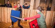 Medieval Weapons Hall at Muncaster Castle & Gardens in Ravenglass, Cumbria