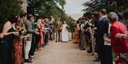Bride and Groom Entrance to a Wedding at Muncaster Castle in Ravenglass, Lake District