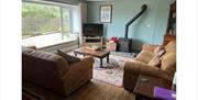 Lounge and Wood Burner at The Old Barn & The Farm House in Keswick, Lake District