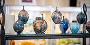 Glassware on display at The Old Courthouse Gallery in Ambleside, Lake District