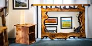 Artwork and mirrors on display at The Old Courthouse Gallery in Ambleside, Lake District
