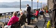 Relaxing Drinks on the Terrace at Macdonald Old England Hotel & Spa in Bowness-on-Windermere, Lake District