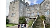 Visitors at Sizergh Castle Using a Tramper Hired from Outdoor Mobility in the Lake District, Cumbria