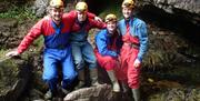 Visitors Caving with Go Cave in the Lake District, Cumbria