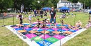 Families playing games at an event held by BarrowFull in Barrow-in-Furness, Cumbria