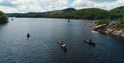 Visitors on a Canoe and Bushcraft Experience with Path to Adventure in the Lake District, Cumbria