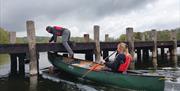 Visitors on a Canoe and Bushcraft Experience with Path to Adventure in the Lake District, Cumbria