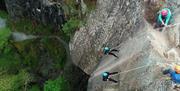 Visitors Abseiling with Path to Adventure in the Lake District, Cumbria