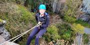 Visitor Abseiling with Path to Adventure in the Lake District, Cumbria