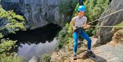 Visitor Abseiling with Path to Adventure in the Lake District, Cumbria