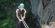 Visitor Abseiling with Path to Adventure in the Lake District, Cumbria