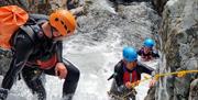 Visitors Extreme Ghyll Scrambling and Canyoning with Path to Adventure in Eskdale, Lake District