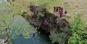 Visitors Extreme Ghyll Scrambling and Canyoning with Path to Adventure in Eskdale, Lake District