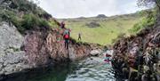 Visitors Extreme Ghyll Scrambling and Canyoning with Path to Adventure in Eskdale, Lake District